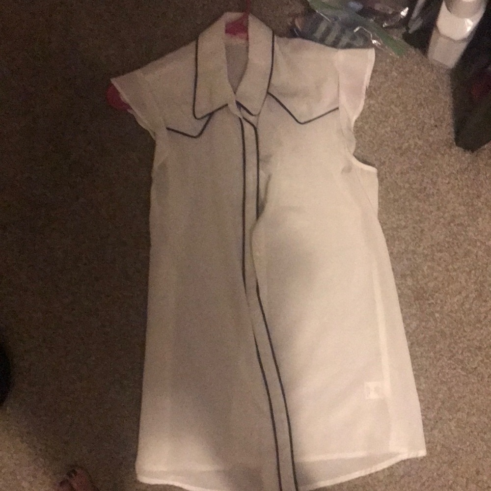 White button down blouse with black lining